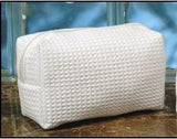 Monogrammed waffle weave cosmetic bag can be embroidered with initials or first name