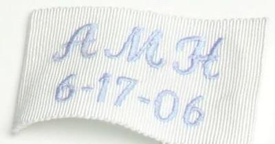 Monogrammed  wedding dress label.
